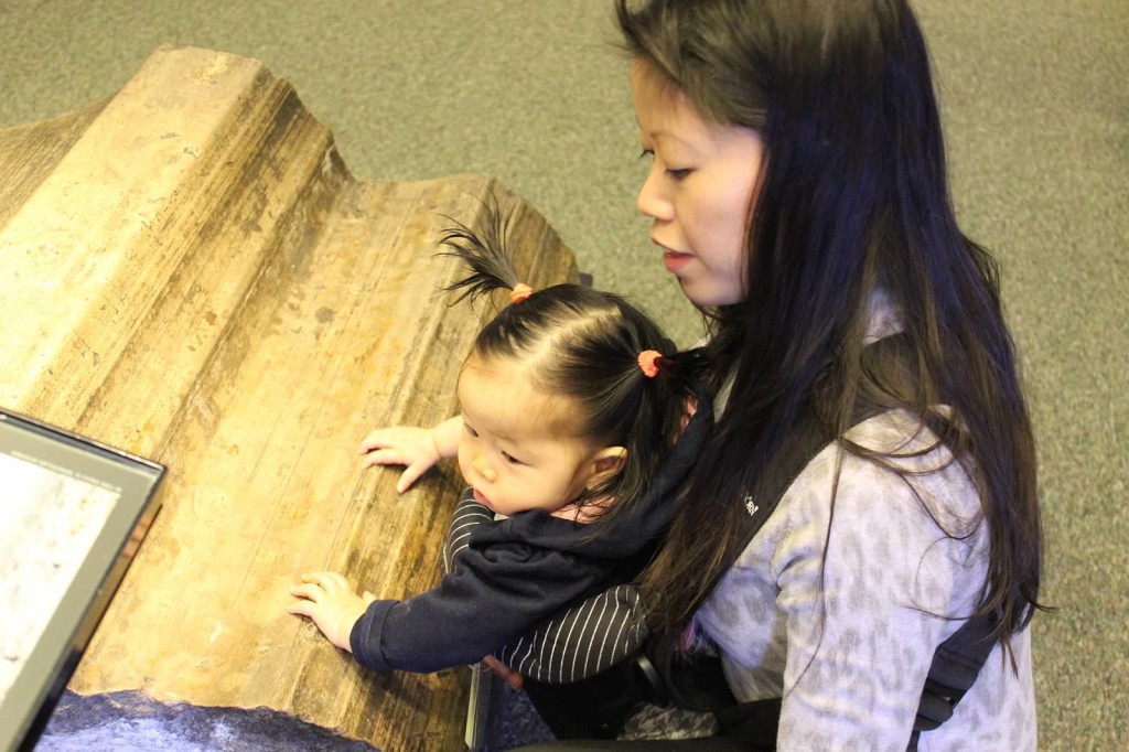 Mother and daughter attend an infant workshop exploring the sense of touch at the National Museum of Natural History